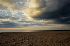 Ciel crpusculaire et sable dor sur la plage d'Houlgate